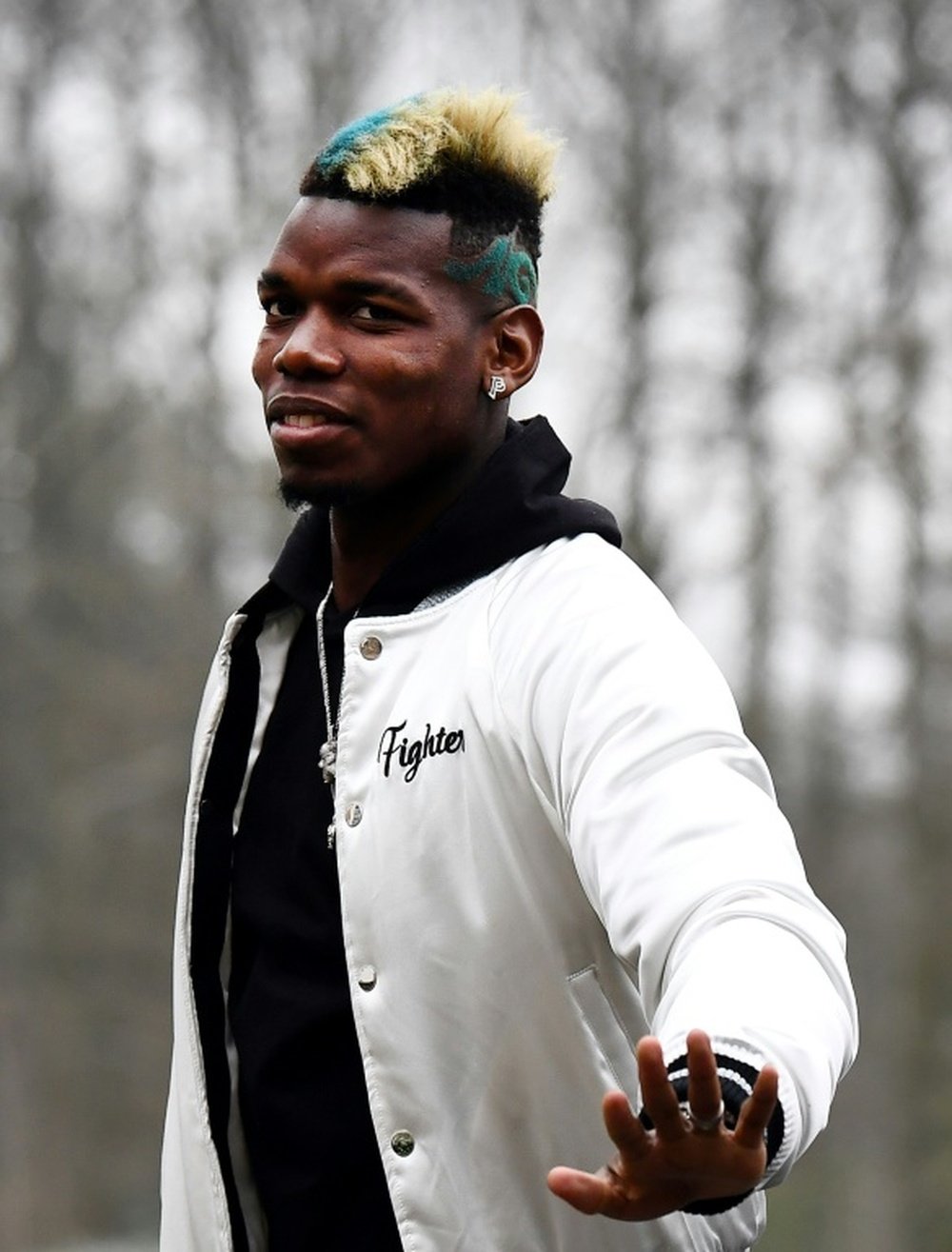 Pogba arrives for training in Clairefontaine-en-Yvelines. AFP