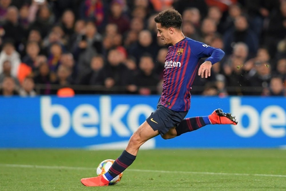 Coutinho pourrait retrouver un poste de milieu relayeur au Barça. AFP