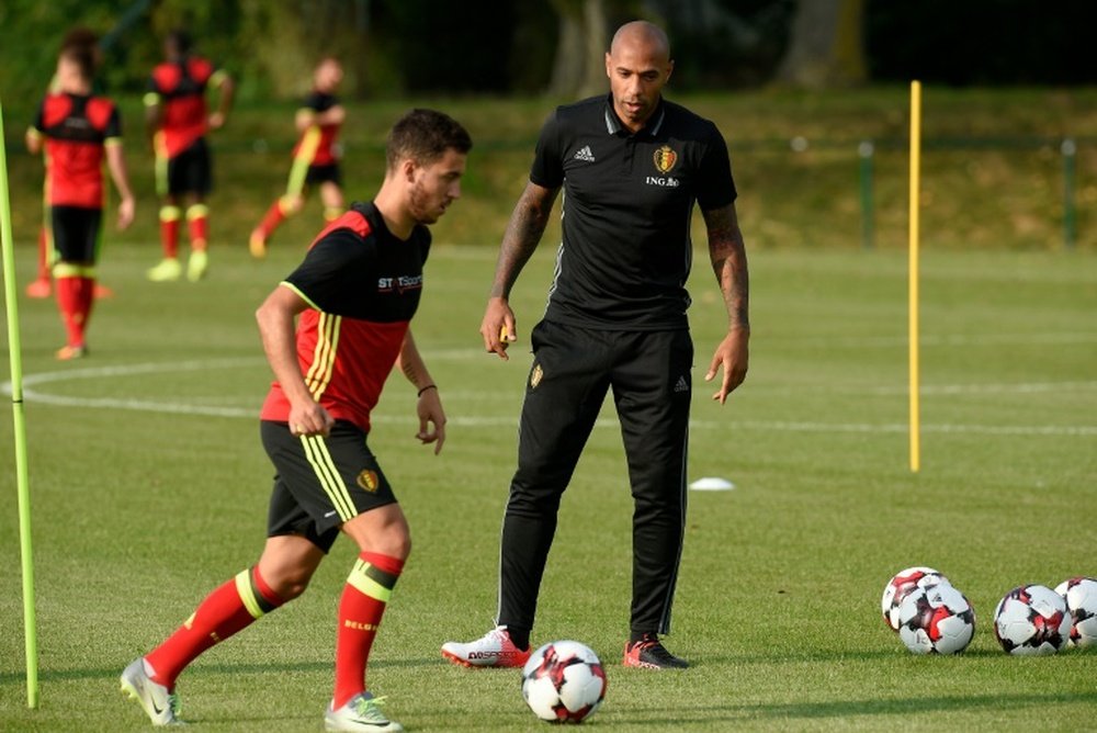 Henry watches Eden Hazard during a training session with Belgium. AFP