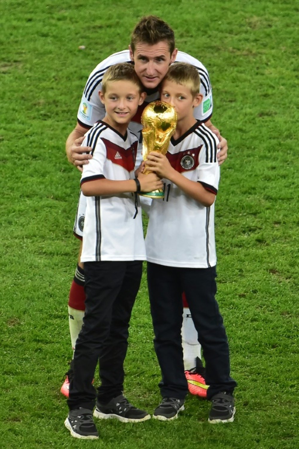 Klose and his two sons. AFP