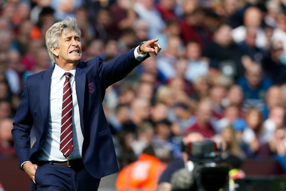 Pellegrini is happy to go toe-to-toe with Spurs if needs be. AFP