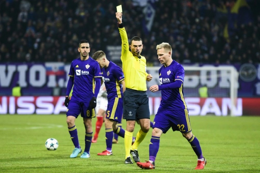 L'arbitre roumain s'est exprimé quant au match aller des barrages. AFP