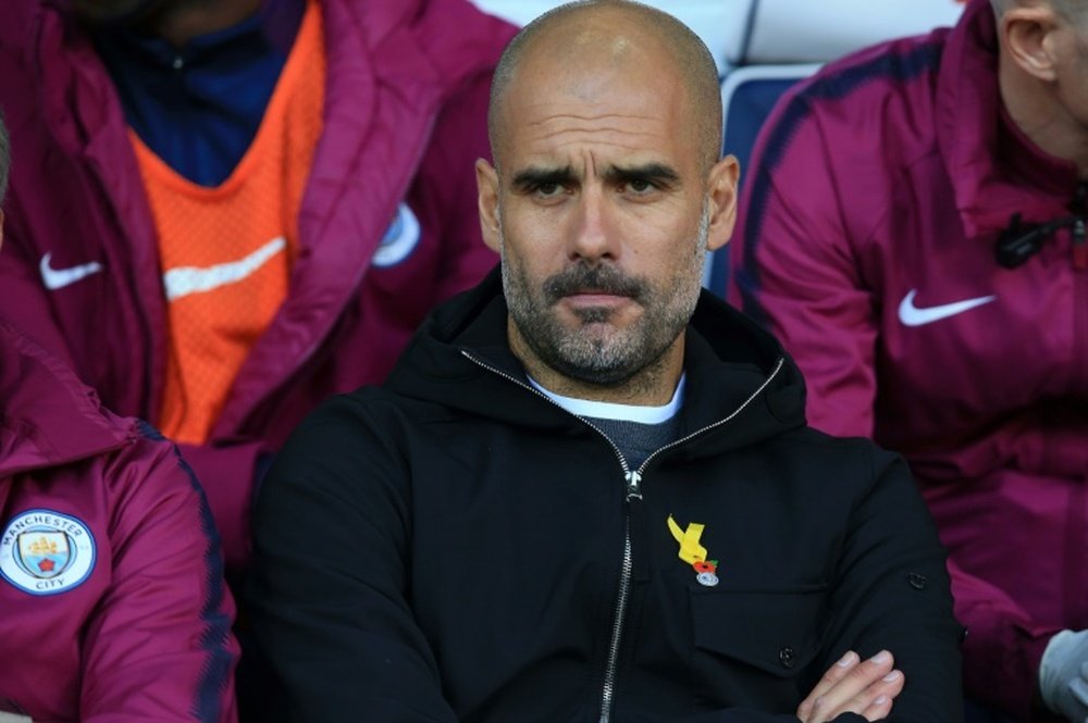 Neville says City must improve their mid-season performance levels. AFP