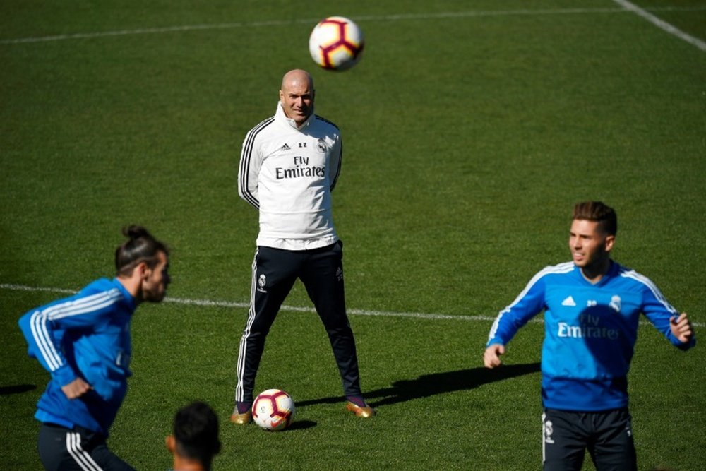 El 'virus FIFA' acosa a 13 jugadores del Madrid. AFP