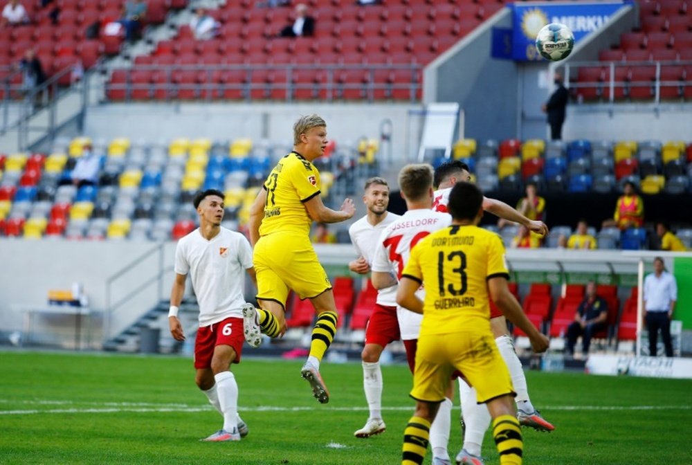 Haaland gave Dortmund a last gasp victory at Dusseldorf. AFP