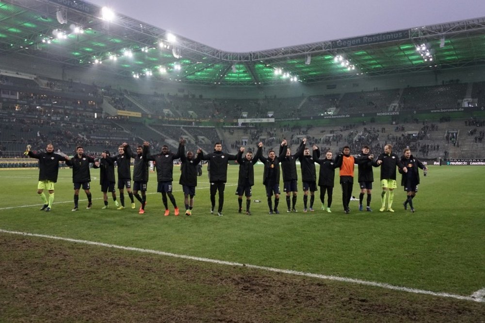 Les joueurs de Leipzig fêtent leur victoire face à Mönchengladbach. AFP