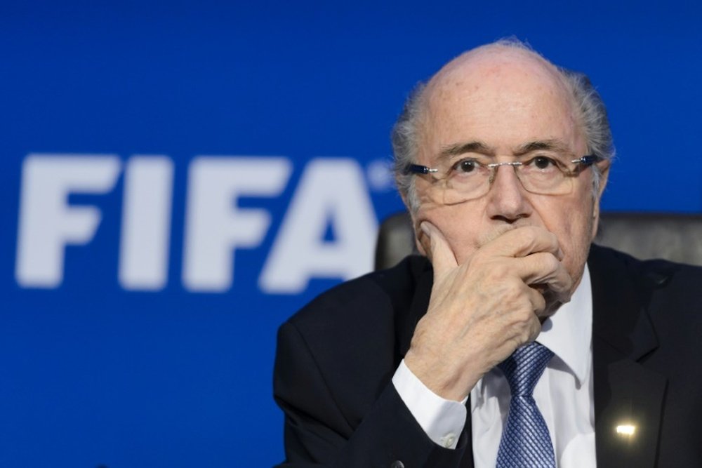 Blatter says he will go to the World Cup in Russia. AFP