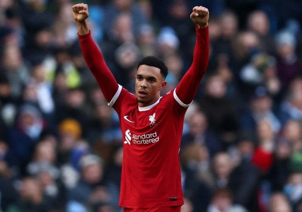 Neville spoke about Trent Alexander-Arnold's performances for Liverpool in a podcast. AFP