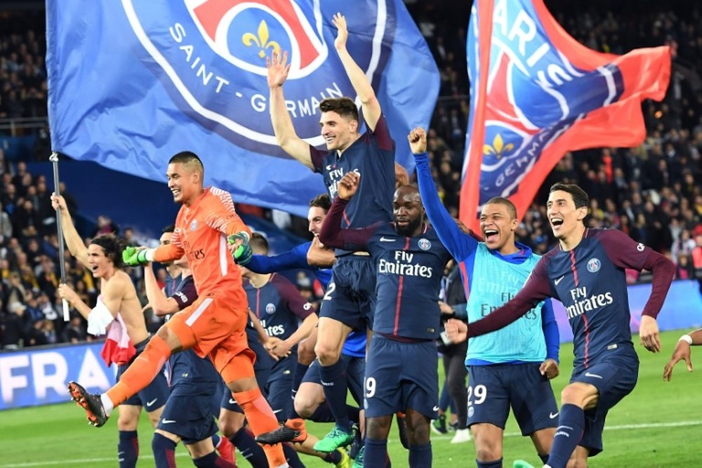 Les joueurs du Paris SG champions de France après leur victoire sur Monaco 7-1. AFP