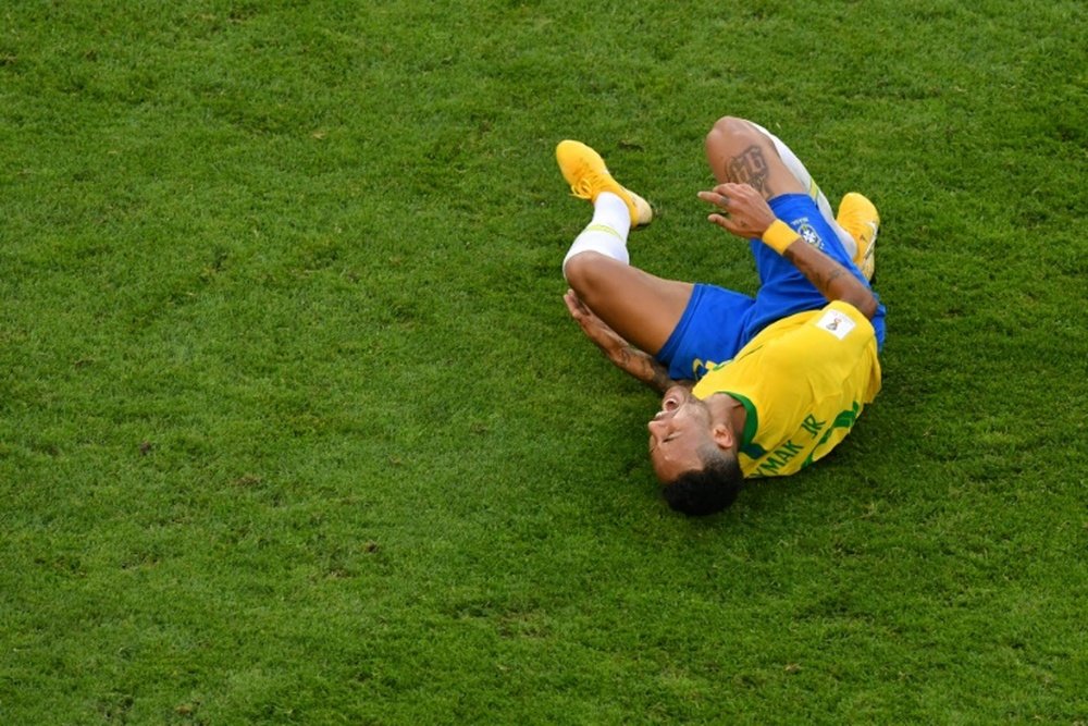Neymar hit the deck. AFP