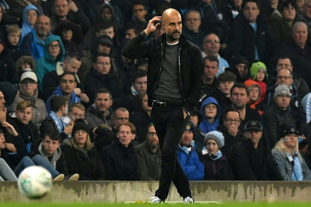 Guardiola claimed the ball in the EFL Cup match against Wolves was 'too light'. AFP