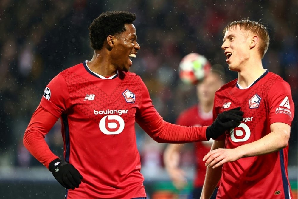 David (L) has racked up 107 goals in 224 appearances for Lille. AFP