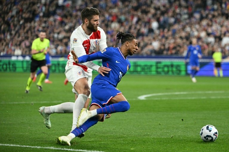 Olise free-kick ends 17-year-long draught for France