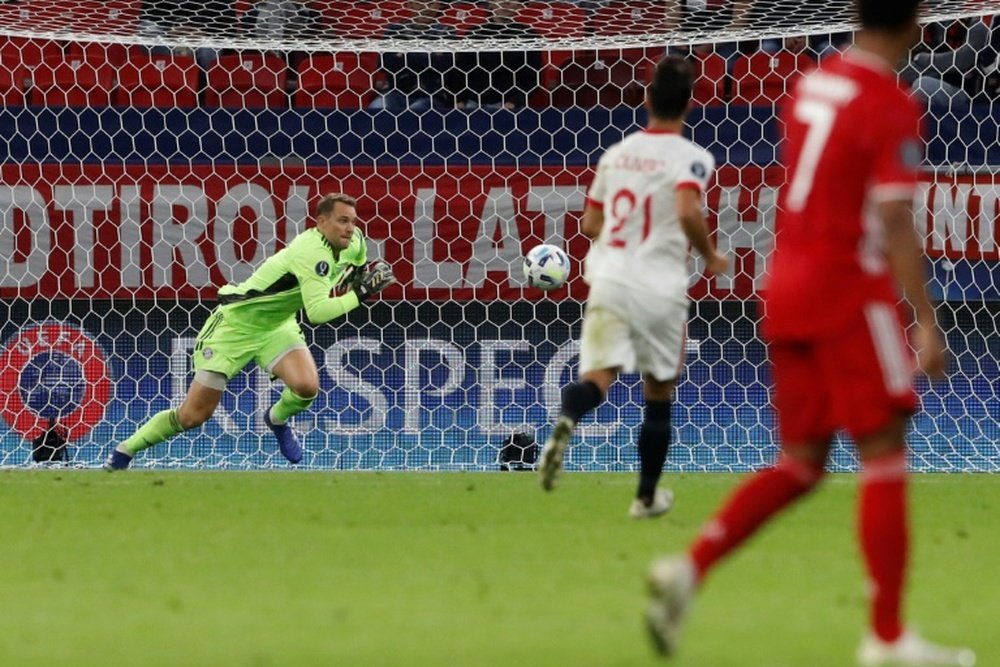 Neuer foi decisivo nas conquistas de Champions, Copa da Alemanha e Supercopa da Alemanha. AFP