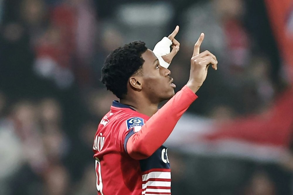El Olympique de Lyon empató a tres con el Lille. AFP