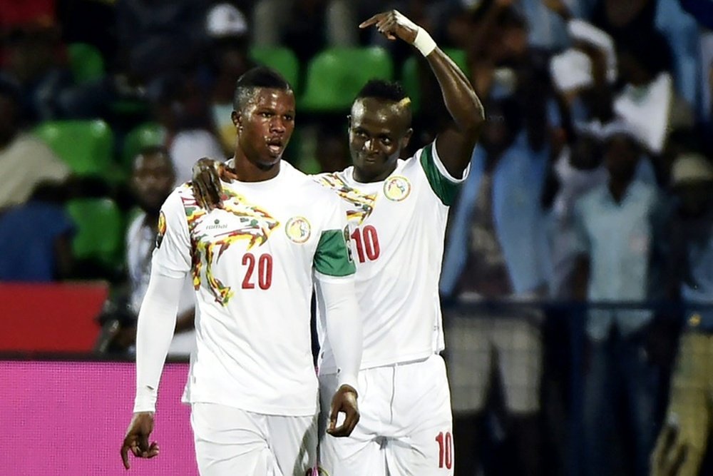Sadio Mane and team-mate celebrating a goal. AFP