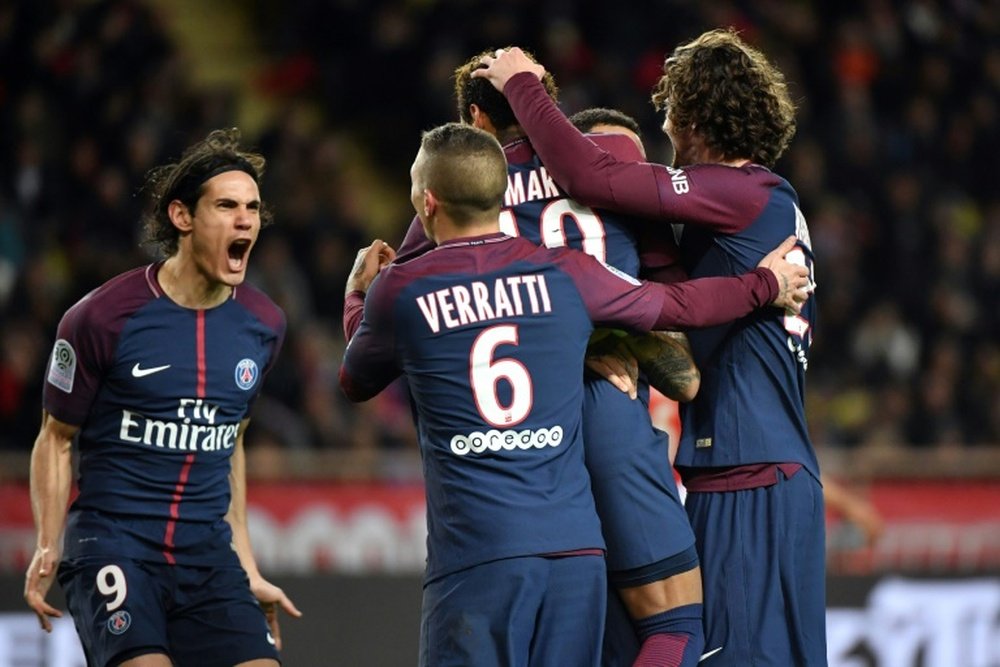 Neymar celebrates scoring from the spot against Monaco. AFP