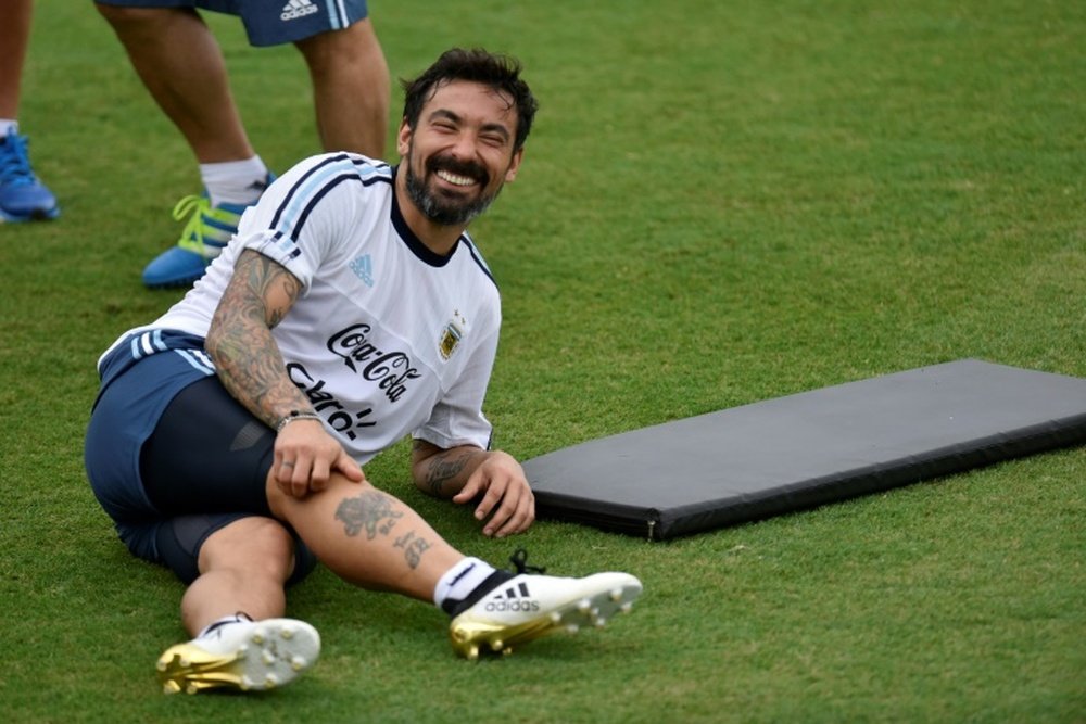 Lavezzi sonríe. AFP