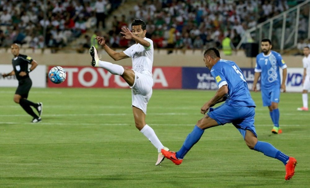 L'Iranien Masoud Shojaei lors dun match face à l'Ouzbékistan en qualifications au Mondial 2018. AFP