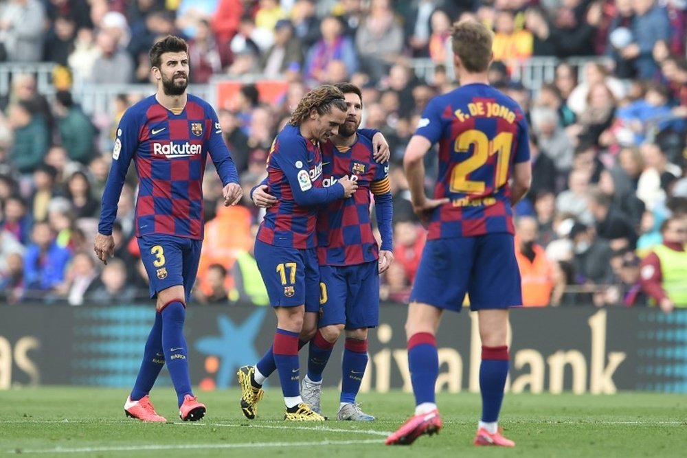 La plantilla del Barça quiere facilitar la situación a club. AFP