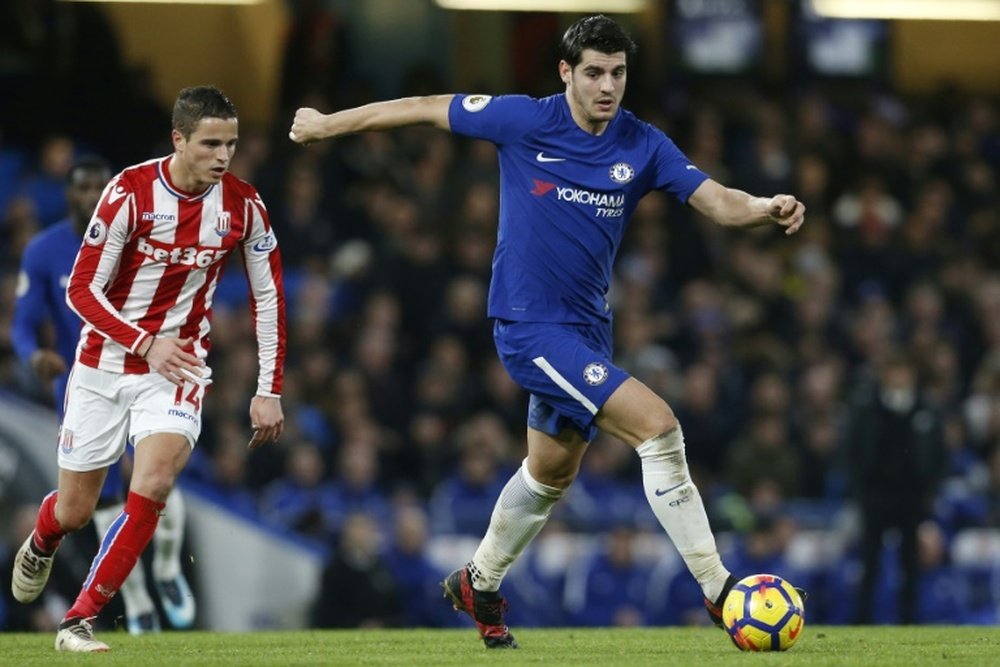 The Chelsea defender has backed his team-mate to end his goal drought. AFP