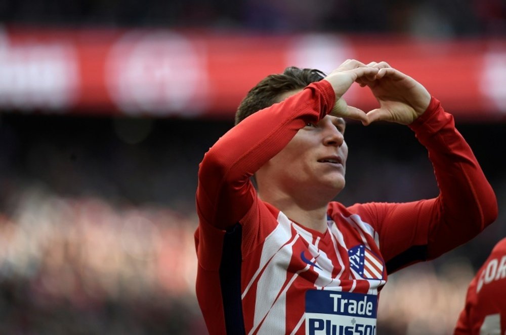 Atletico Madrid will not stop in pursuit of Barcelona, promises Gameiro. AFP