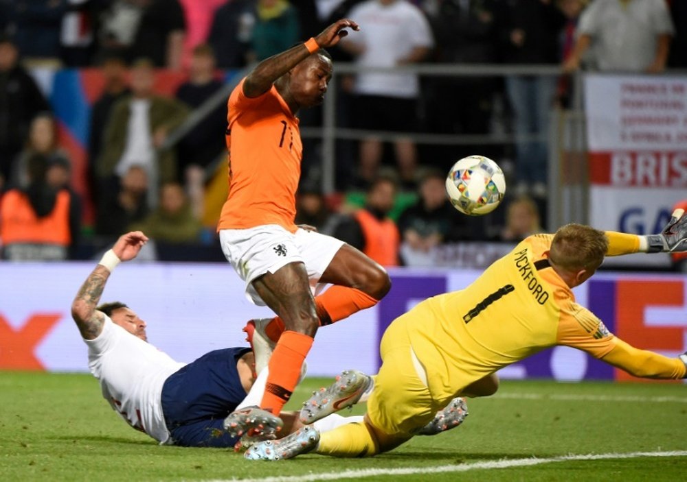 Walker's own goal following Stones' error put the Dutch ahead. AFP