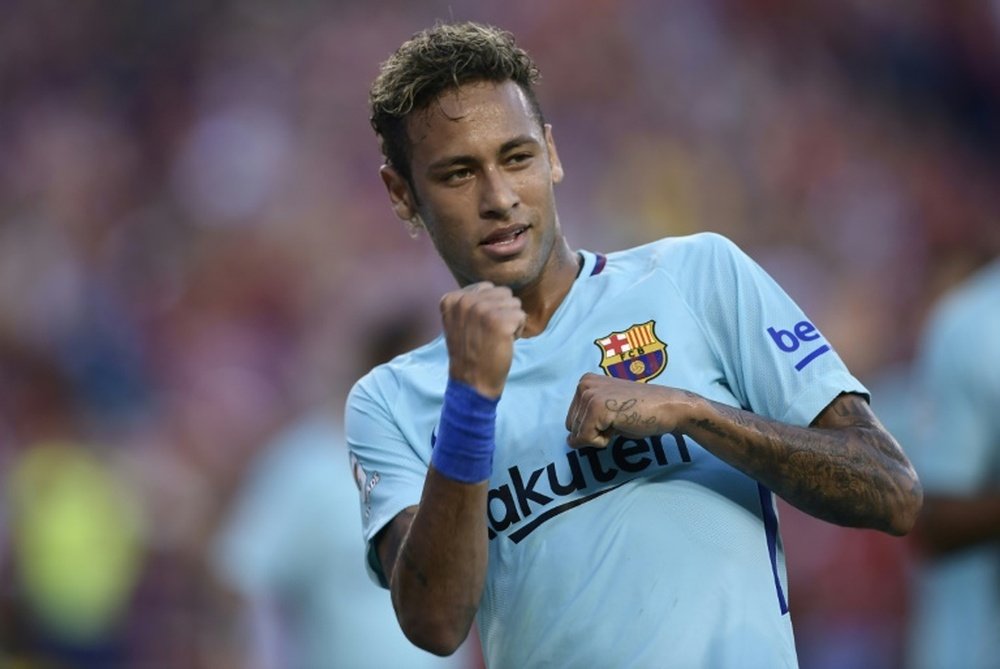 Barca and Neymar end litigation amicably. AFP