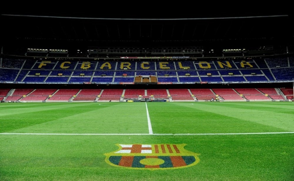 Las lluvias afectaron al campo del Barça. AFP
