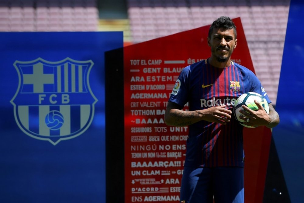 Paulinho was presented as Barcelona player. AFP