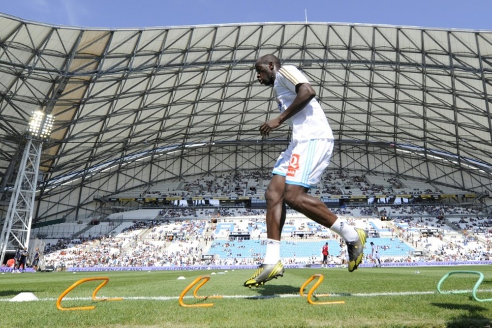 Le défenseur Souleymane Diawara lors dun échauffement avec l'OM avant un match contre Evian. AFP