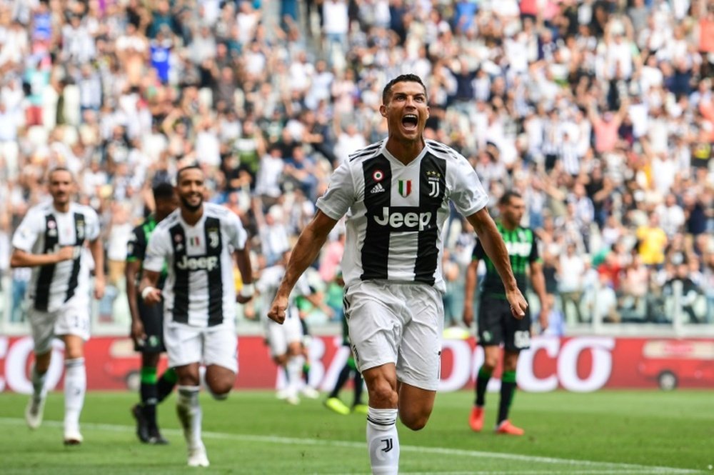 Cristiano al fin pudo gritar gol. AFP