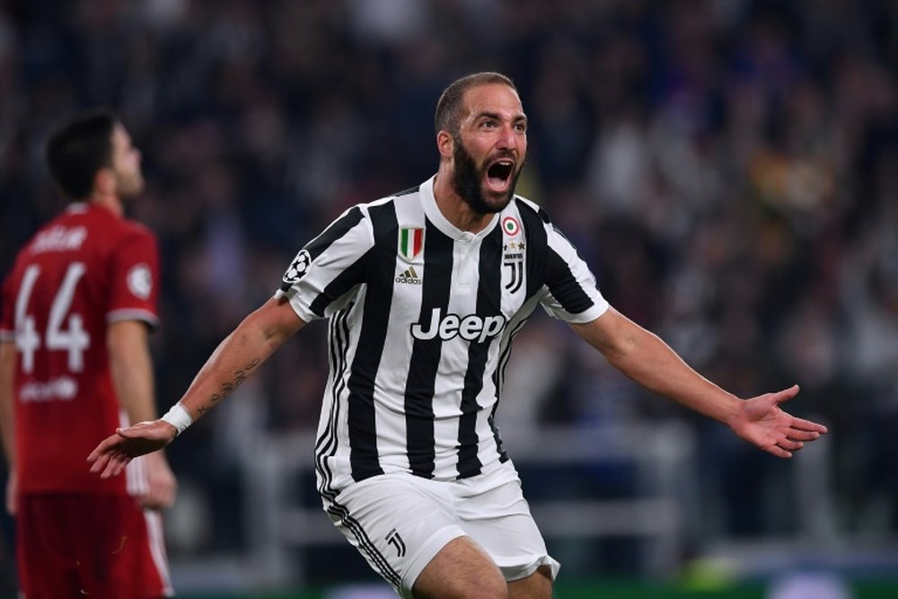 Higuain came off the bench to open the scoring for Juventus in their 2-0 win over Olympiakos. AFP