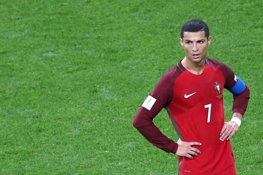 Cristiano Ronaldo se fue de la Confederaciones como llegó, guardando silencio. AFP