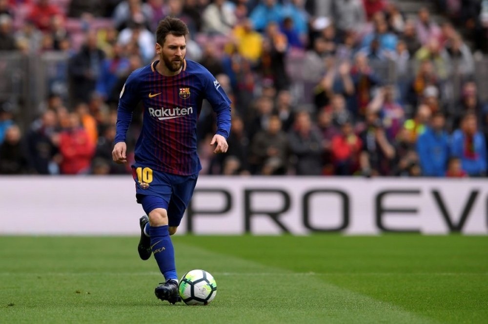 La star du FC Barcelone Lionel Messi contre Valence au Camp Nou, le 14 avril 2018. AFP