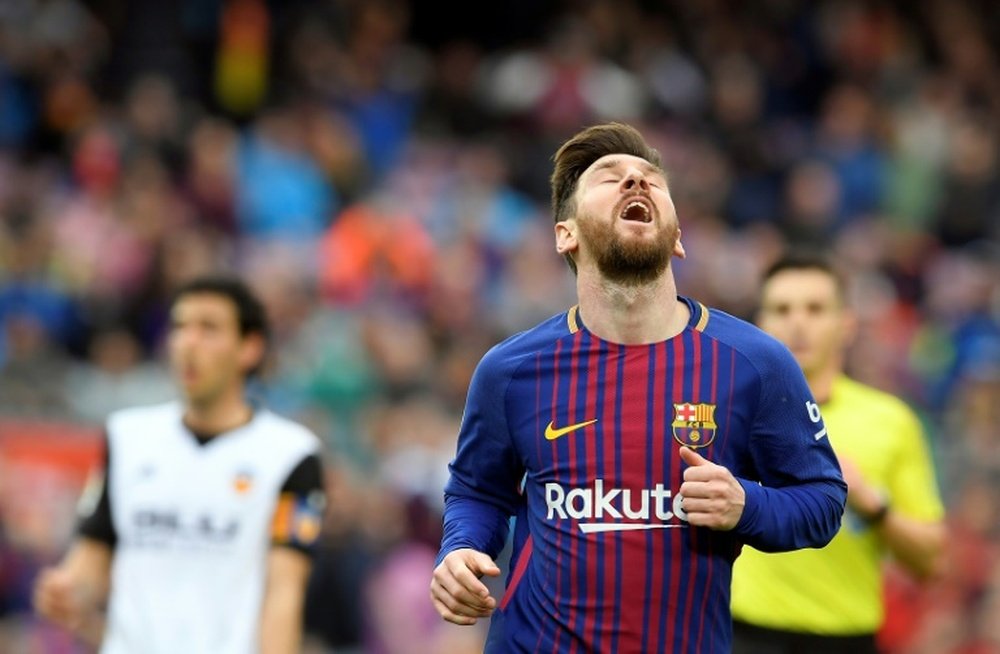 Messi toujours dérangé par sa lésion musculaire. AFP