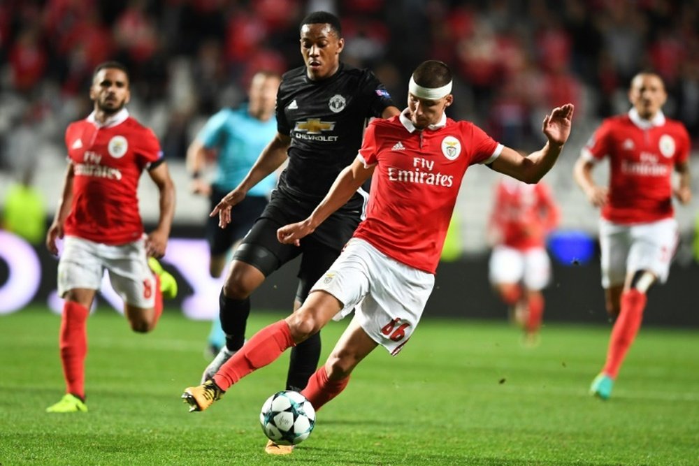 United won the away match at Benfica 1-0. AFP