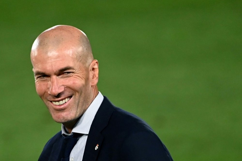 Como técnico, Zidane soma 55 vitórias como local e 45 como visitante no Campeonato Espanhol. AFP