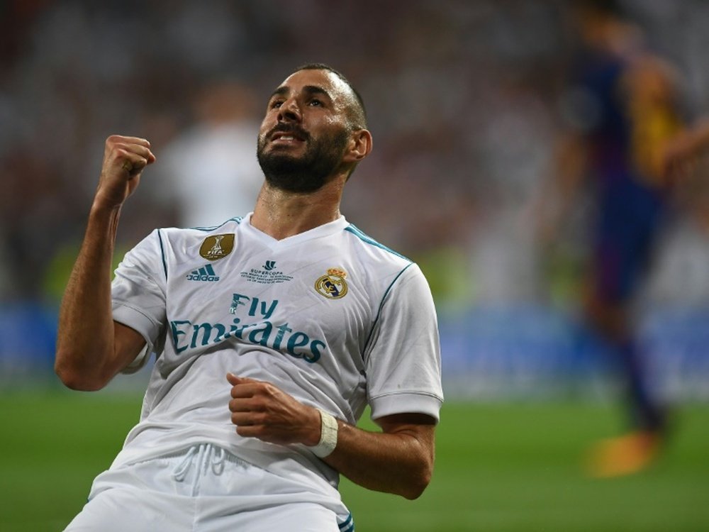 Benzema has agree a new deal with Real. AFP