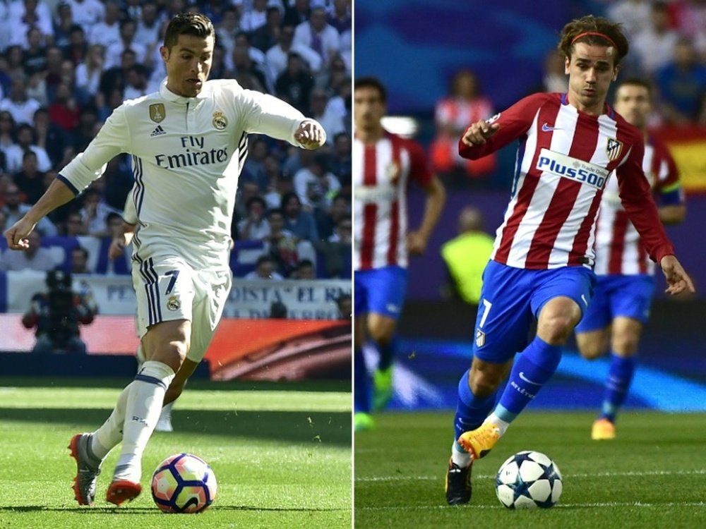 Cristiano y Griezmann, cara a cara en el derbi europeo. AFP