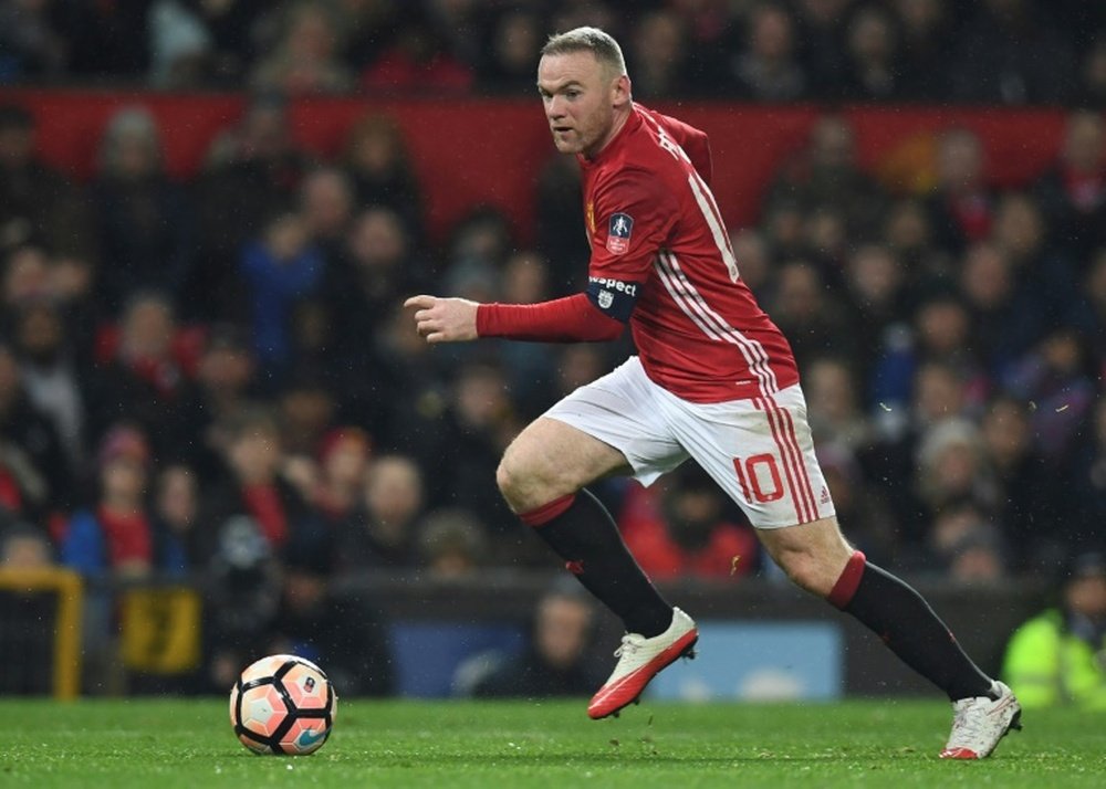 Manchester United captain Wayne Rooney in action. AFP