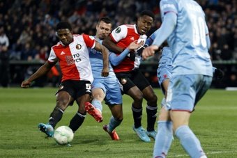 Feyenoord have agreed to sell Malacia (L) to Lyon. AFP