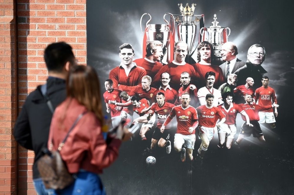 A panel at Old Trafford featuring Manchester United greats. AFP