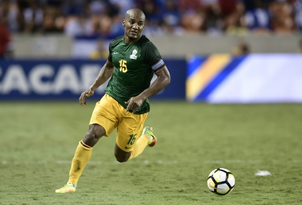 Florent Malouda s'échappe avec le ballon lors du match avec la Guyane française. AFP