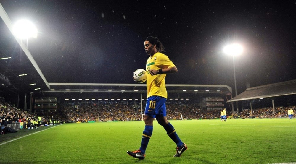Ronaldinho fête ses 38 ans. AFP