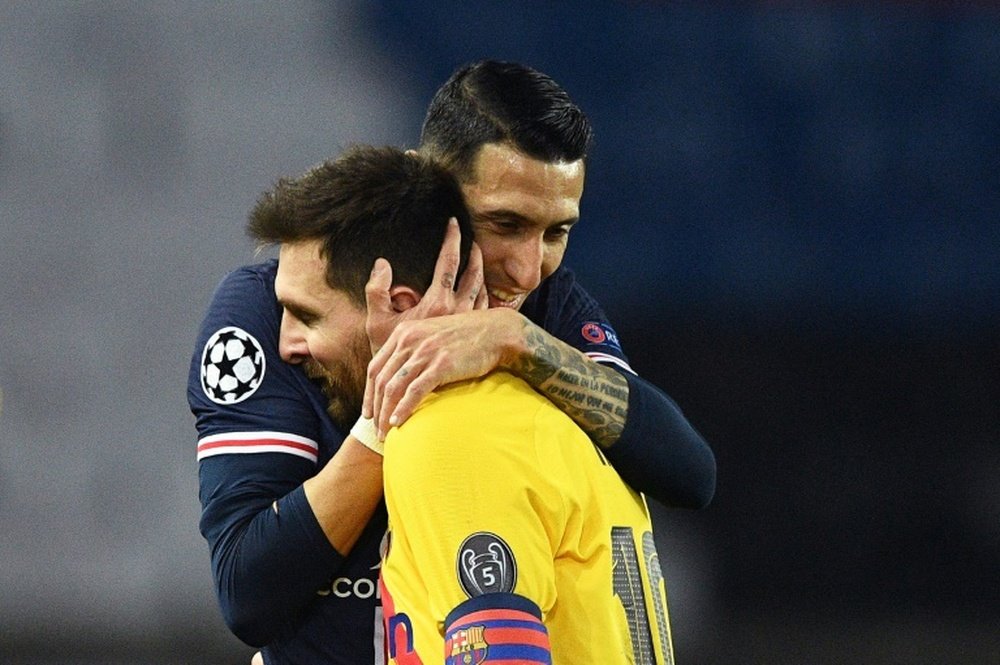 Di María está encantado de tener en el equipo a Leo Messi. AFP