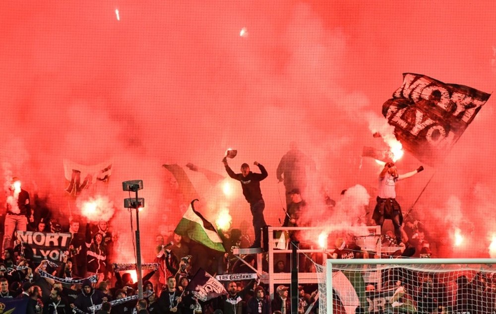 'Les ultras viennent de prouver que ce sont eux qui savent le mieux défendre le football'. AFP