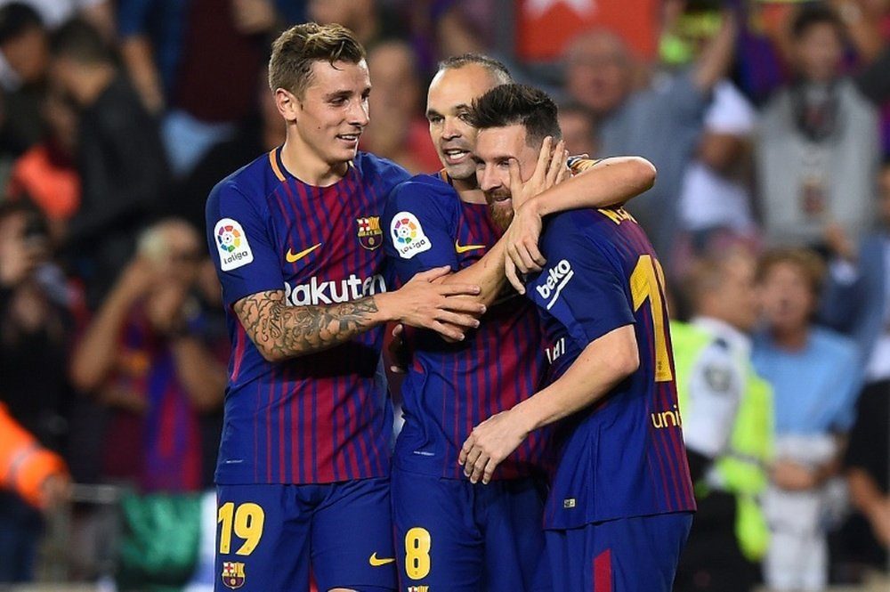 Messi impliqué dans 500 des buts du Barça. AFP
