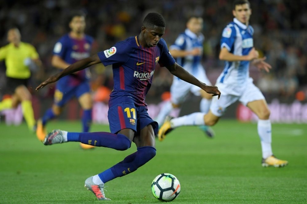 La nouvelle recrue barcelonaise Ousmane Dembélé contre l'Espanyol au Camp Nou. AFP