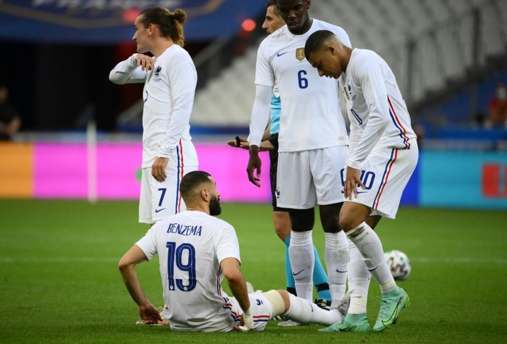 Karim Benzema sort sur blessure. AFP